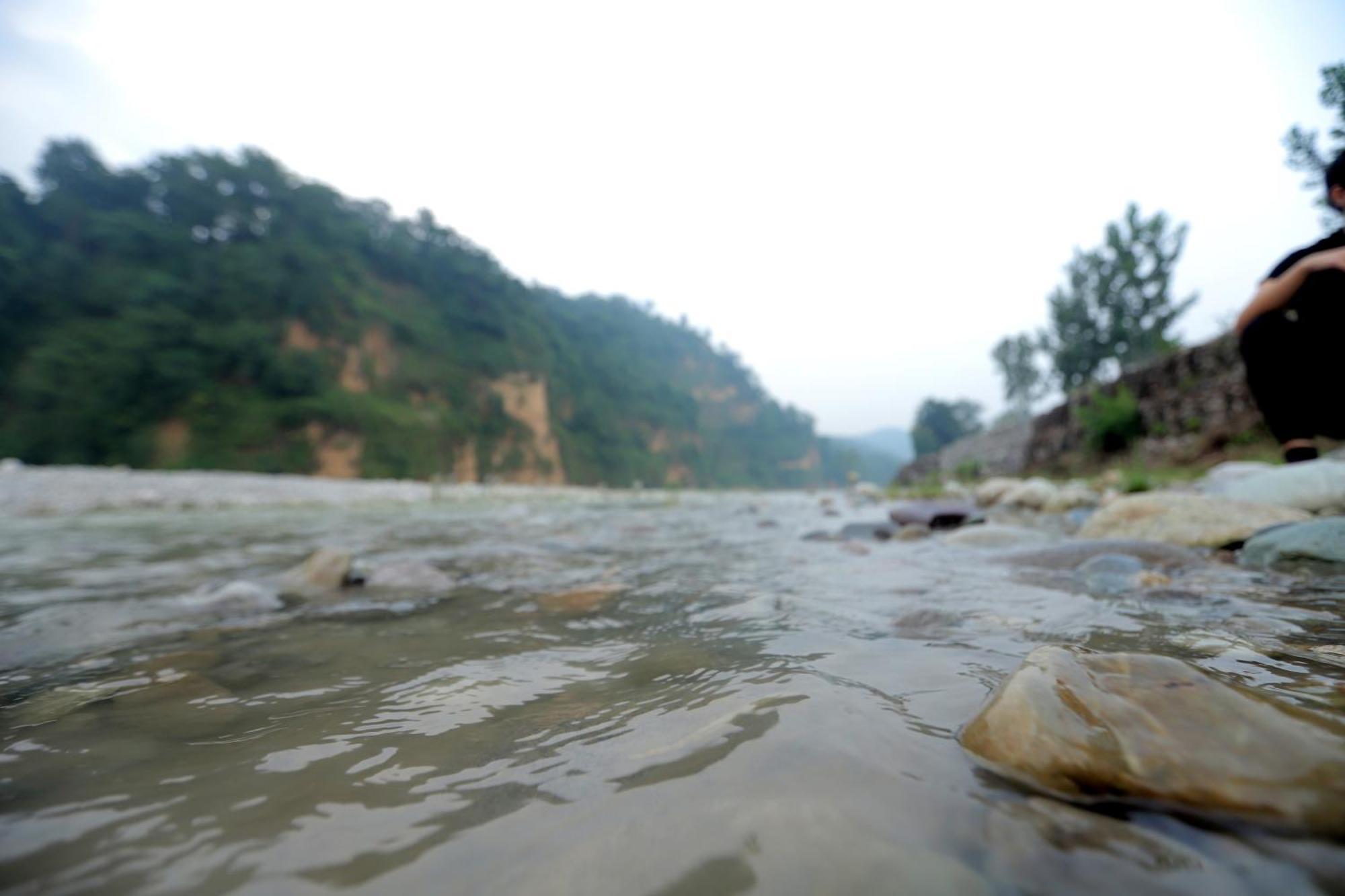 Riverside By Aahma Garjia Buitenkant foto